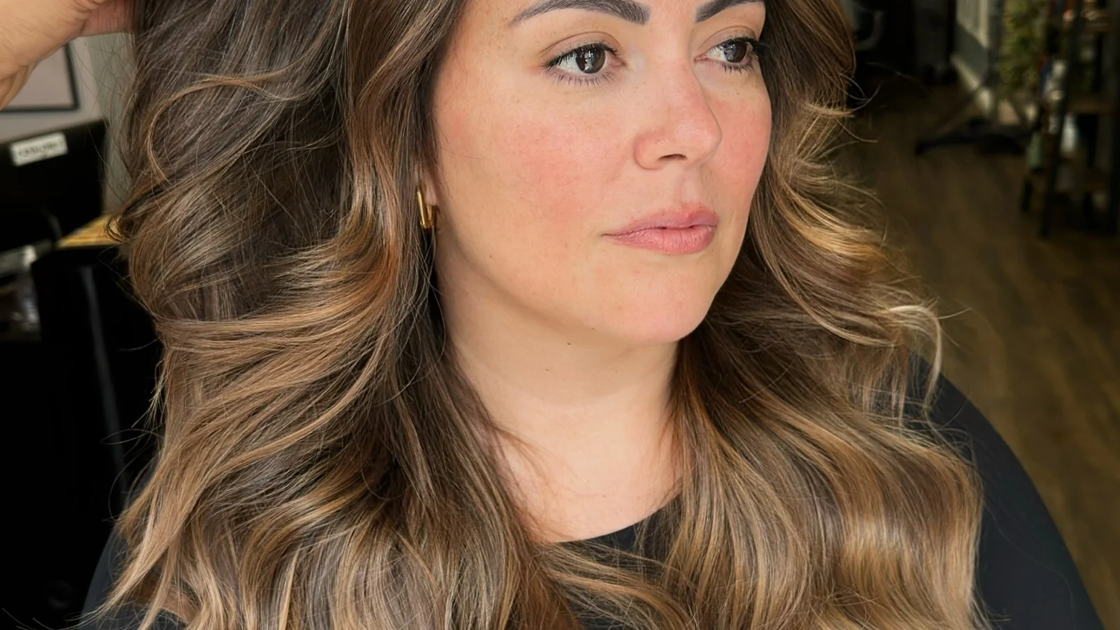 Long brunette hair with sun-kissed highlights and a blowdry finish, Capel Street Dublin