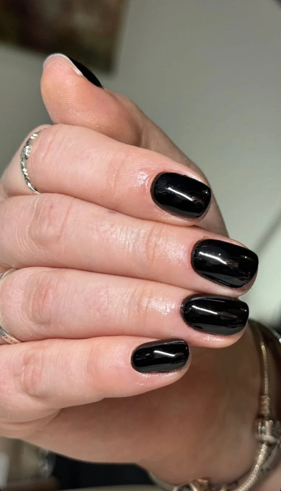 Glossy black BIAB nail extensions with french tip shape done on Capel Street, Dublin 1