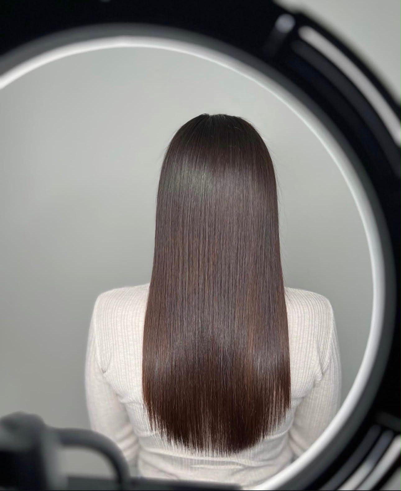 Long, smooth, glossy women's hair after a Brazilian keratin treatment at Blend Beauty Artisans, Capel Street Dublin